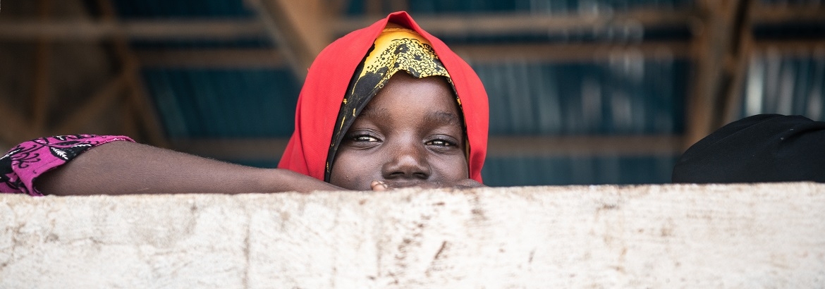 A girl in Marka,  Lower Shabelle, a town liberated from a violent extremist group a few years ago. Photo: IOM/Rikka Tupaz 2021