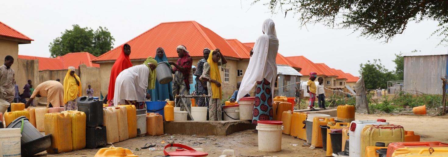 Women gather water in Gubio Camp, Borno State, Nigeria @ IOM Nigeria, 2021